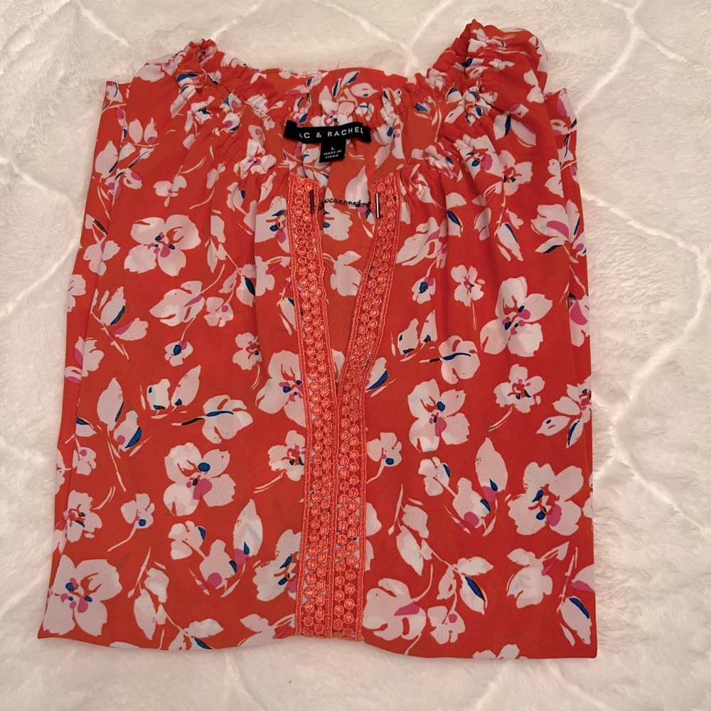 Zac & Rachel floral top with crochet and chain detail. Flowy & flattering.